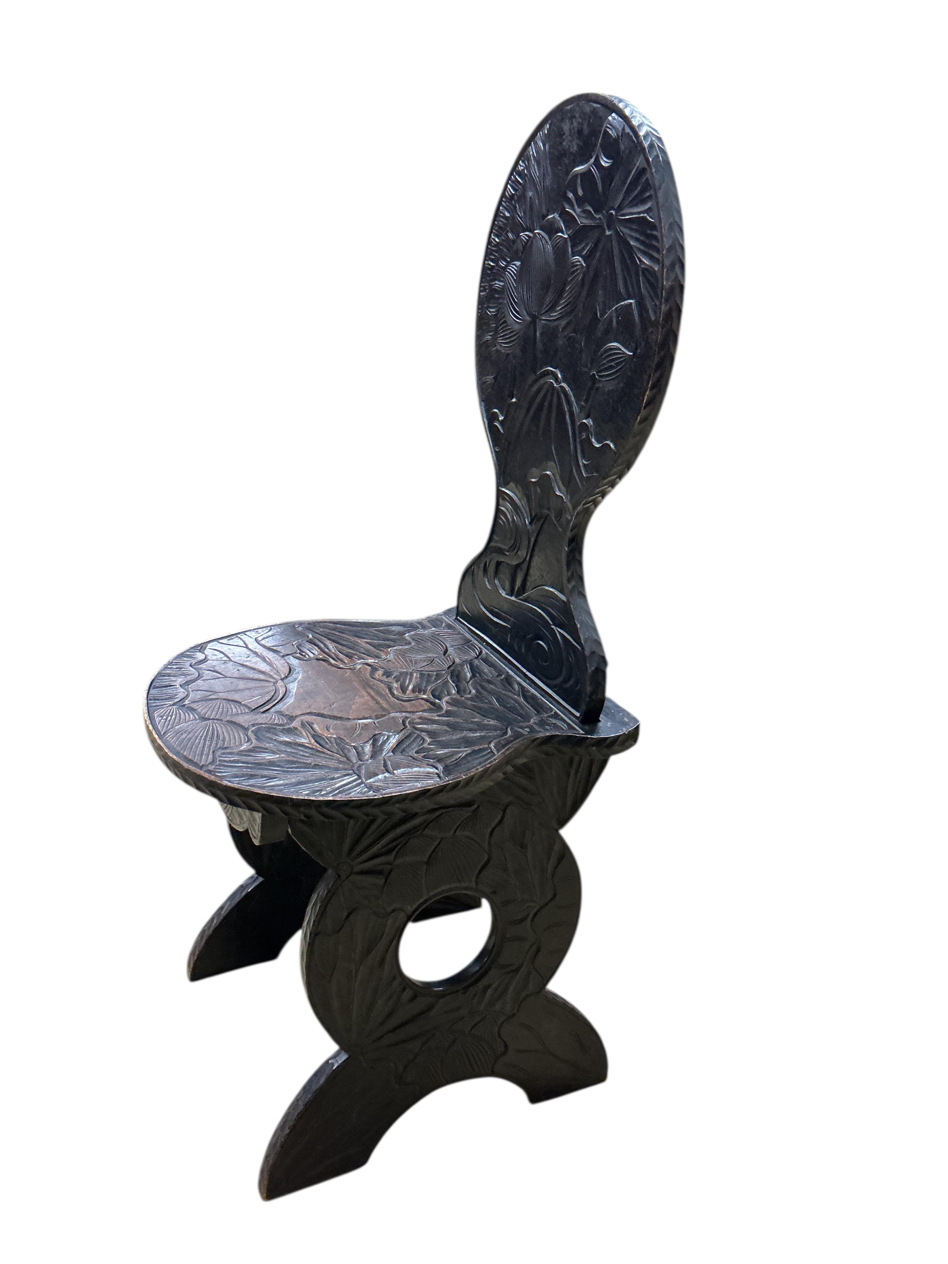 A Japanese carved hardwood hall chair for Liberty, width 39cm, depth 44cm, height 100cm